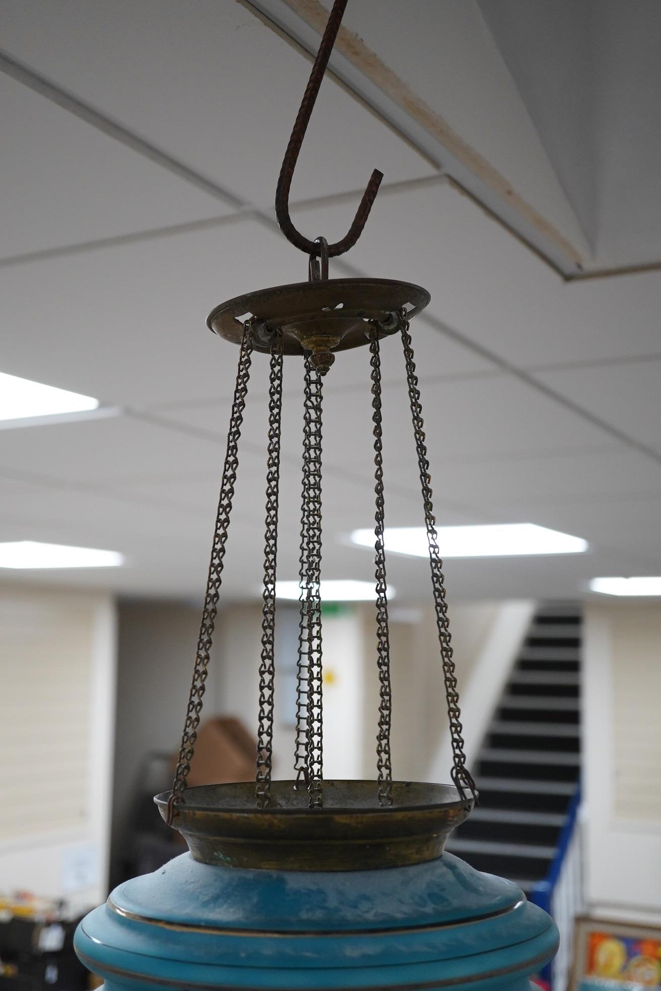 A Biedermeier enamelled blue glass hanging lamp, 36cm high. Condition - fair.